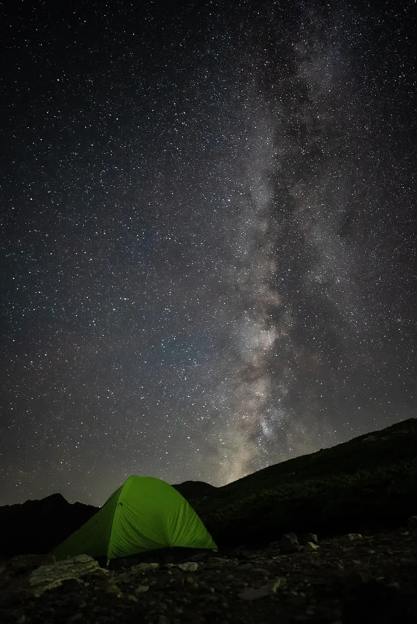 Starry night sky with the Milky Way above a camping tent in Egypt’s Western Desert near Siwa Oasis.